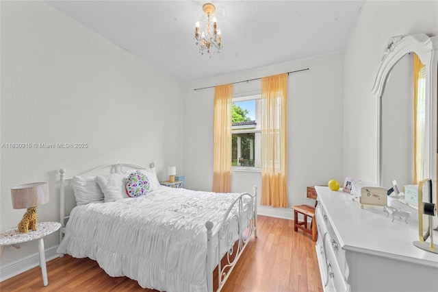 19442 SW 39th St, Miramar, FL 33029 - bedroom featuring a chandelier and light wood finished floors