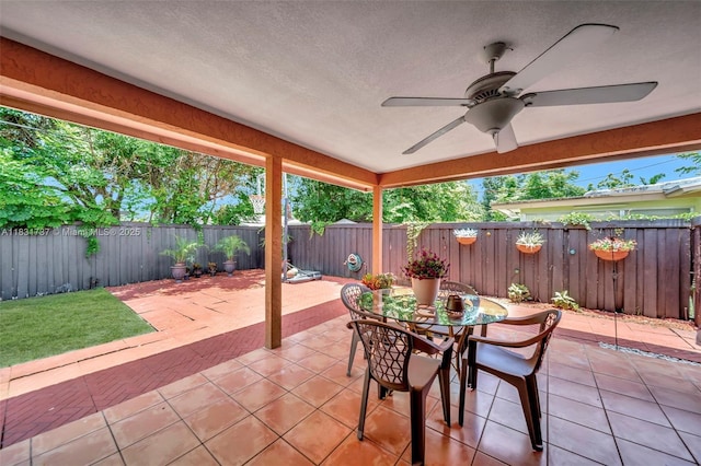 2201 N 57th Ter, Hollywood, FL 33021 - fenced backyard featuring a patio, a ceiling fan, and outdoor dining area