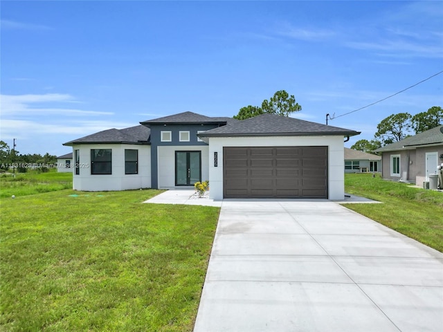 2505 40th, Lehigh Acres, FL 33976 - prairie-style house with stucco siding, a garage, french doors, and a front yard