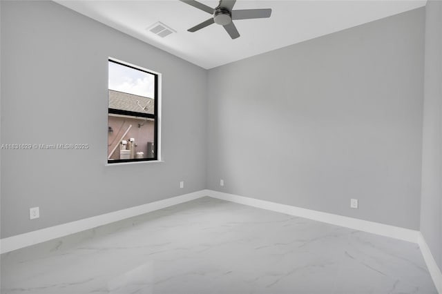 2505 40th, Lehigh Acres, FL 33976 - empty room with marble look tiles and ceiling fan