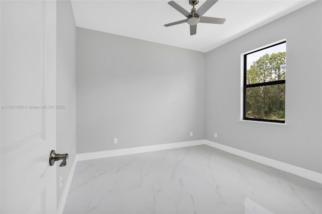 2505 40th, Lehigh Acres, FL 33976 - empty room featuring marble look tile flooring and ceiling fan