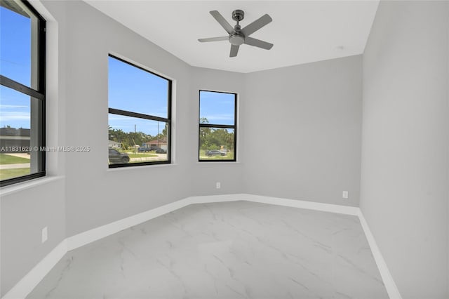 2505 40th, Lehigh Acres, FL 33976 - unfurnished room with marble look tile flooring and ceiling fan