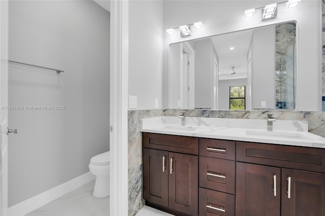 2505 40th, Lehigh Acres, FL 33976 - bathroom featuring double vanity and marble look tile flooring