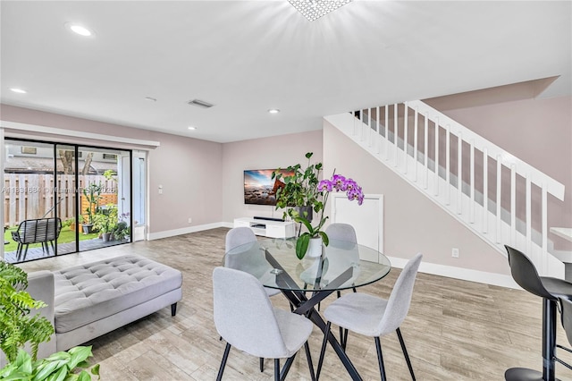 10527 NW 6th St, Pembroke Pines, FL 33026 - dining area featuring stairway, wood finished floors, and recessed lighting