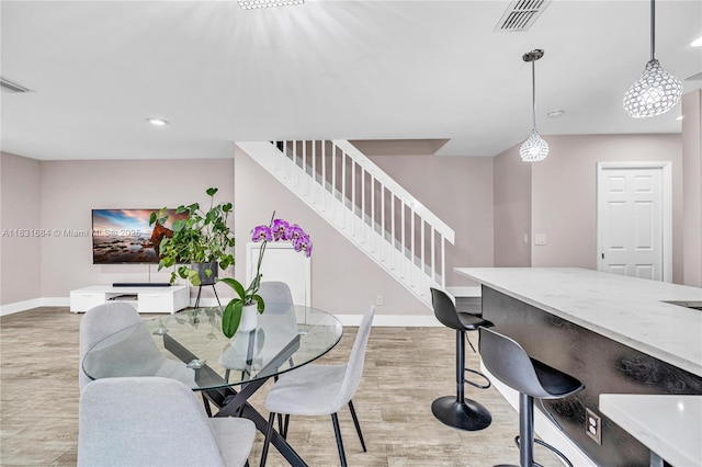 10527 NW 6th St, Pembroke Pines, FL 33026 - dining room with stairway, light wood finished floors, and recessed lighting