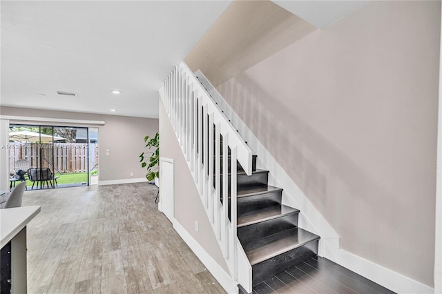 10527 NW 6th St, Pembroke Pines, FL 33026 - staircase with wood finished floors and recessed lighting