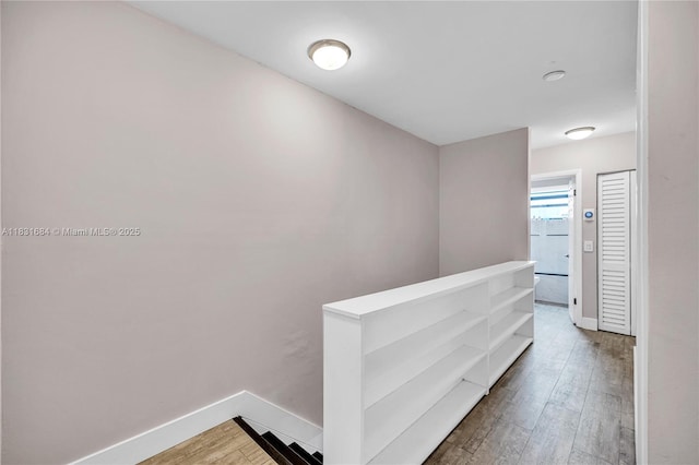 10527 NW 6th St, Pembroke Pines, FL 33026 - hallway featuring baseboards and wood finished floors