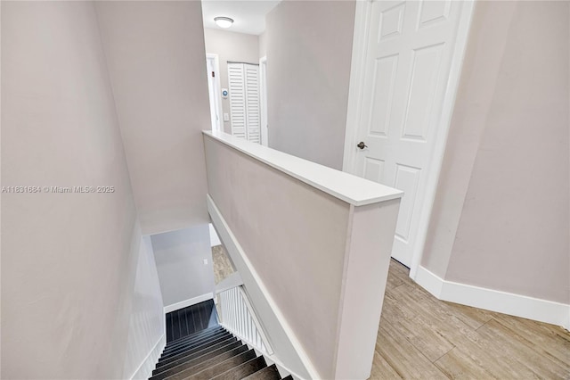 10527 NW 6th St, Pembroke Pines, FL 33026 - staircase featuring wood finished floors and baseboards