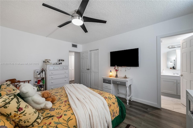 2800 Somerset Dr Unit 215J, Lauderdale Lakes, FL 33311 - bedroom featuring a textured ceiling, a closet, wood finished floors, a ceiling fan, and connected bathroom