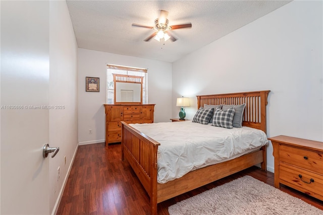 18481 NW 22nd St, Pembroke Pines, FL 33029 - bedroom featuring dark wood-type flooring, a textured ceiling, and a ceiling fan