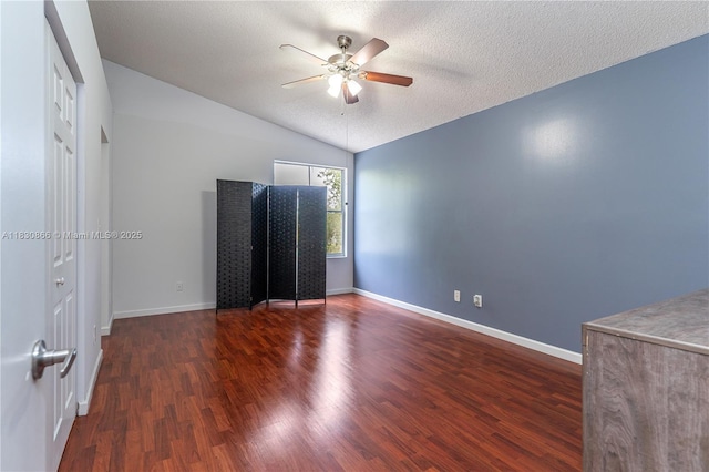 18481 NW 22nd St, Pembroke Pines, FL 33029 - empty room with ceiling fan, vaulted ceiling, wood finished floors, and a textured ceiling