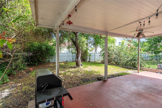 18481 NW 22nd St, Pembroke Pines, FL 33029 - fenced backyard with a patio area, ceiling fan, and grilling area