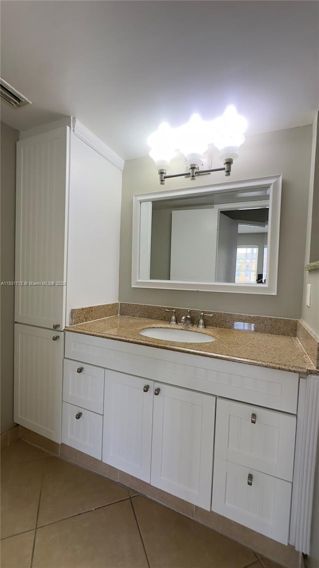 1145 Lake Shore Dr Unit 205, Lake Park, FL 33403 - bathroom with vanity and tile patterned floors