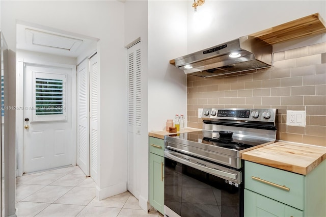 7900 SW Springhaven Ave, Indian Town, FL 34956 - kitchen featuring green cabinets, electric range, wood counters, and exhaust hood
