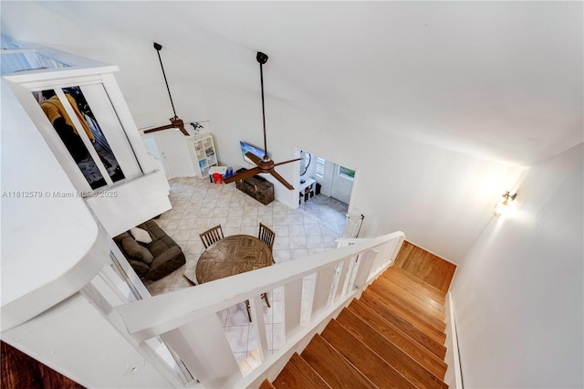 7900 SW Springhaven Ave, Indian Town, FL 34956 - staircase with lofted ceiling, wood finished floors, and ceiling fan