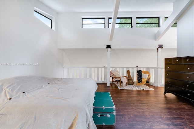 7900 SW Springhaven Ave, Indian Town, FL 34956 - bedroom featuring wood finished floors and a towering ceiling