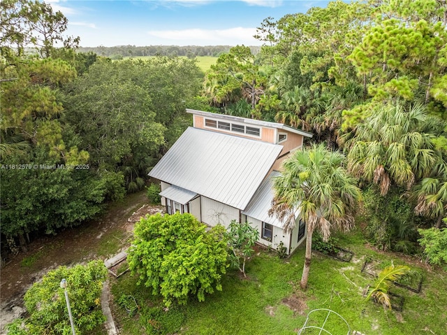 7900 SW Springhaven Ave, Indian Town, FL 34956 - view from above of property featuring a heavily wooded area