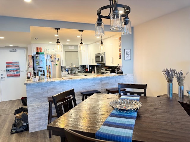 400 N Surf Rd Unit 804, Hollywood, FL 33019 - dining room featuring wood finished floors and recessed lighting