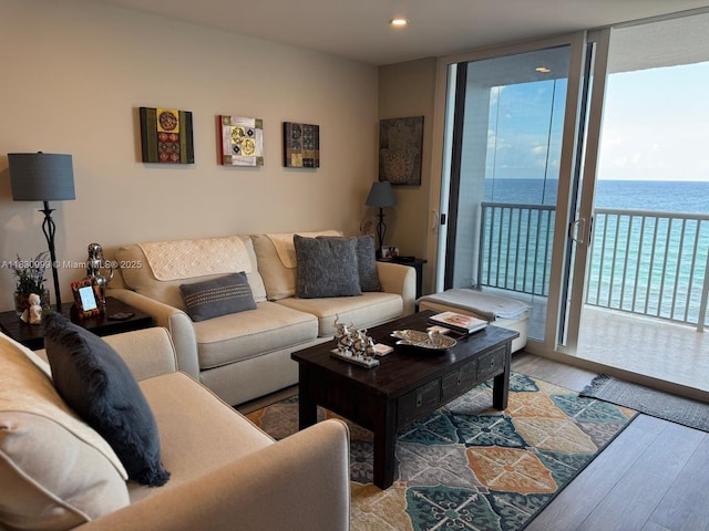 400 N Surf Rd Unit 804, Hollywood, FL 33019 - living area featuring expansive windows, wood finished floors, a water view, and recessed lighting