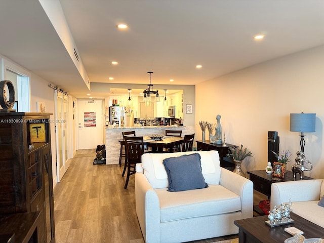 400 N Surf Rd Unit 804, Hollywood, FL 33019 - living room featuring light wood-style floors and recessed lighting