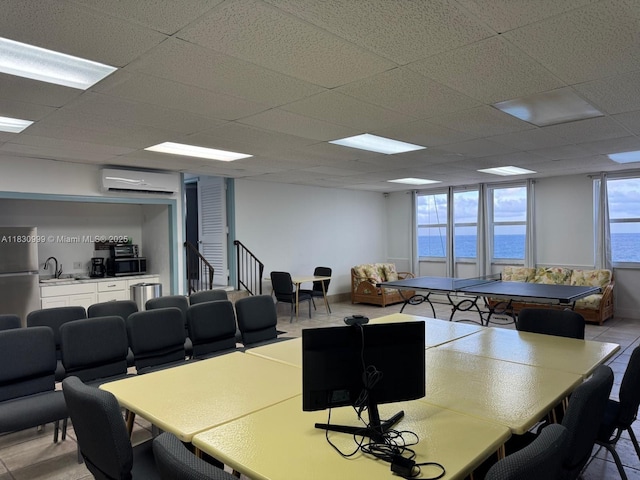 400 N Surf Rd Unit 804, Hollywood, FL 33019 - dining area with a wall mounted AC, a paneled ceiling, and a water view