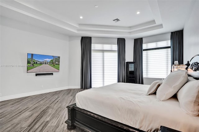 11056 Blackhawk Blvd, Davie, FL 33328 - bedroom with a raised ceiling, wood finished floors, and recessed lighting