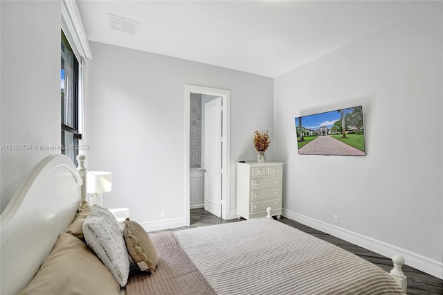 11056 Blackhawk Blvd, Davie, FL 33328 - bedroom with wood finished floors and ensuite bath