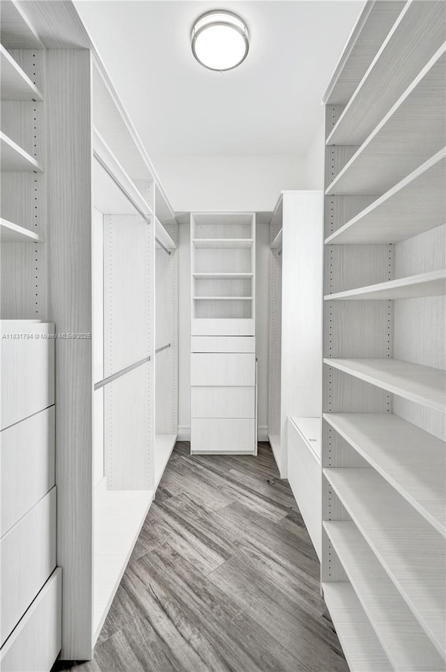 11056 Blackhawk Blvd, Davie, FL 33328 - spacious closet with wood finished floors and a heating unit