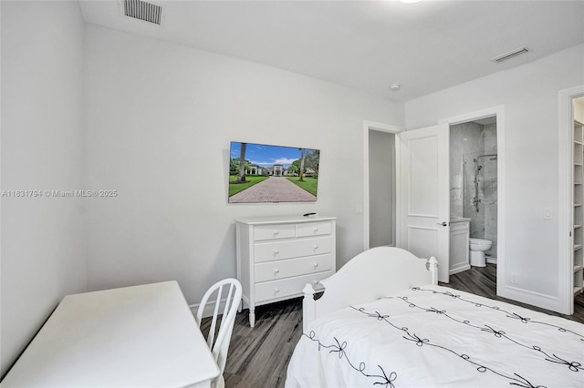 11056 Blackhawk Blvd, Davie, FL 33328 - bedroom featuring wood finished floors and ensuite bath
