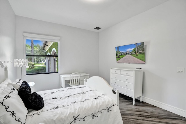 11056 Blackhawk Blvd, Davie, FL 33328 - bedroom featuring baseboards and wood finished floors