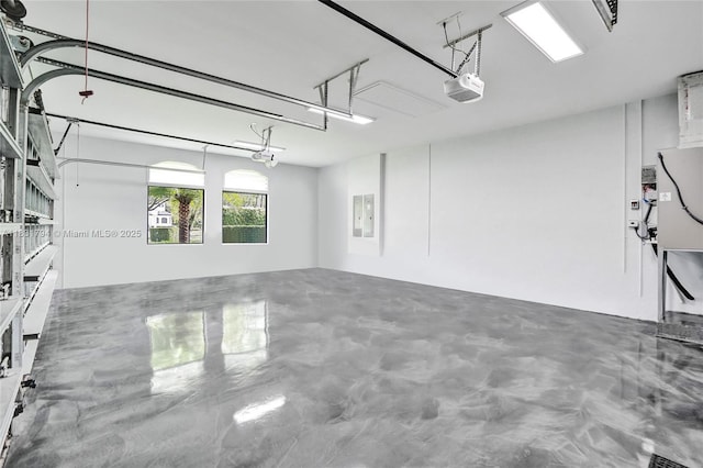 11056 Blackhawk Blvd, Davie, FL 33328 - garage featuring electric panel and a garage door opener