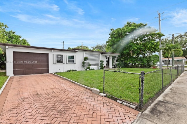 7201 Hayes St, Hollywood, FL 33024 - view of front facade featuring stucco siding, a garage, and decorative driveway