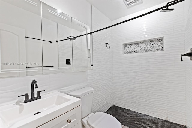 7201 Hayes St, Hollywood, FL 33024 - bathroom featuring a stall shower, vanity, and tile walls