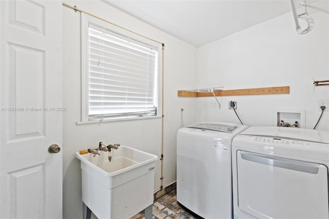 7201 Hayes St, Hollywood, FL 33024 - laundry room featuring washer and dryer and dark stone finish floors