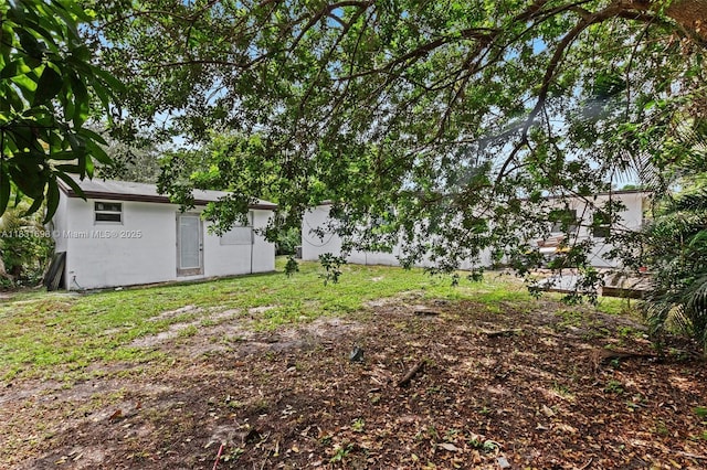 7201 Hayes St, Hollywood, FL 33024 - view of grassy yard featuring an outbuilding