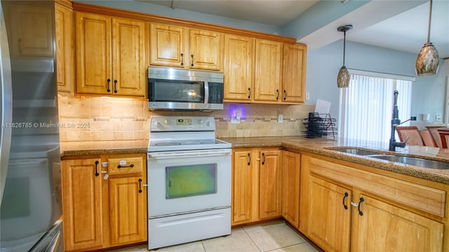11101 SW 15th Mnr, Davie, FL 33324 - kitchen featuring stainless steel appliances, dark stone countertops, decorative backsplash, and hanging light fixtures