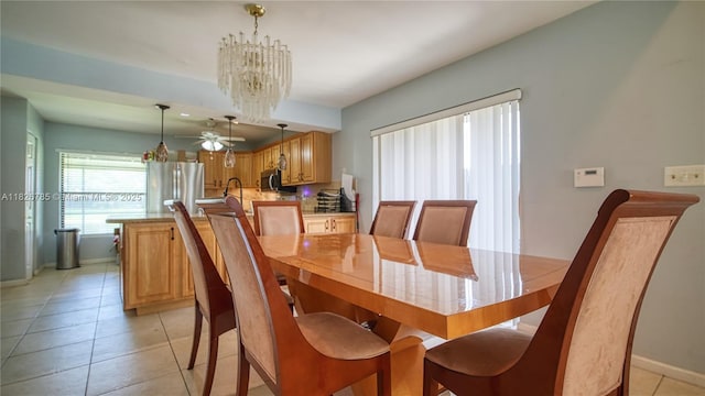 11101 SW 15th Mnr, Davie, FL 33324 - dining space with light tile patterned floors, ceiling fan, and a chandelier