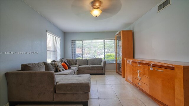 11101 SW 15th Mnr, Davie, FL 33324 - living area with light tile patterned floors and a ceiling fan