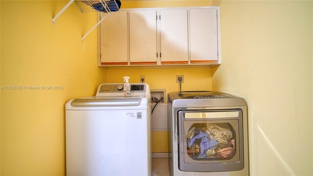 11101 SW 15th Mnr, Davie, FL 33324 - washroom with cabinet space and washing machine and clothes dryer