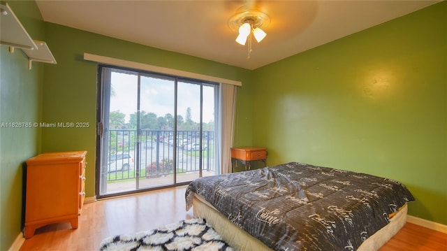 11101 SW 15th Mnr, Davie, FL 33324 - bedroom featuring access to outside and wood finished floors