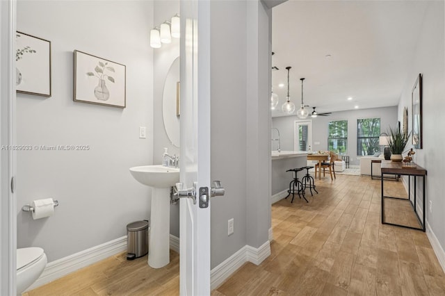 8367 NW 7th Pl Unit 0, Plantation, FL 33324 - bathroom with wood finished floors, a ceiling fan, and recessed lighting