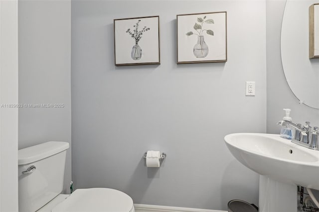 8367 NW 7th Pl Unit 0, Plantation, FL 33324 - bathroom with toilet and a sink