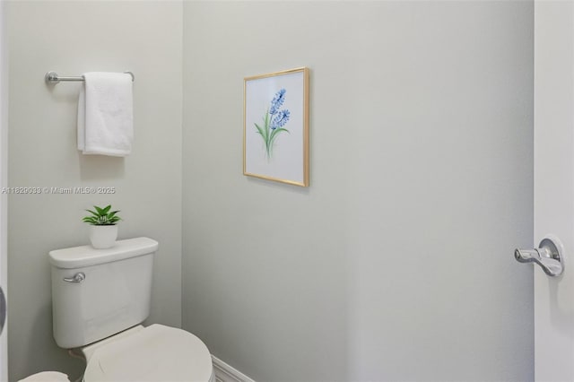 8367 NW 7th Pl Unit 0, Plantation, FL 33324 - bathroom with toilet and baseboards
