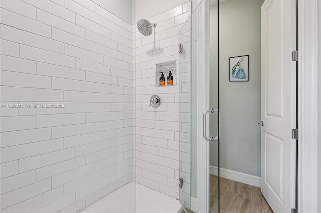 8367 NW 7th Pl Unit 0, Plantation, FL 33324 - bathroom featuring a shower stall and wood finished floors