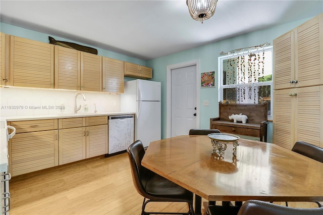 1884 Juno Rd, North Palm Beach, FL 33408 - dining area featuring light wood-style flooring
