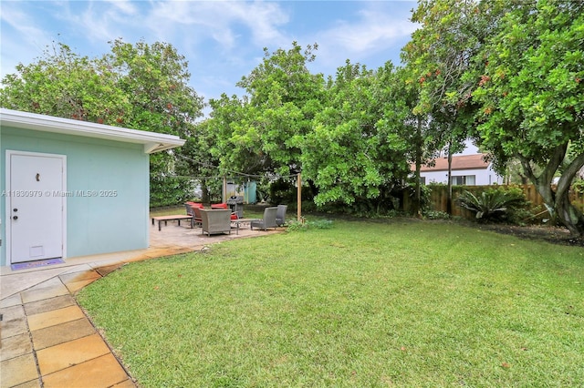 1884 Juno Rd, North Palm Beach, FL 33408 - view of yard featuring a patio area