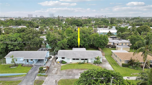 1884 Juno Rd, North Palm Beach, FL 33408 - view of urban area featuring a tree filled landscape