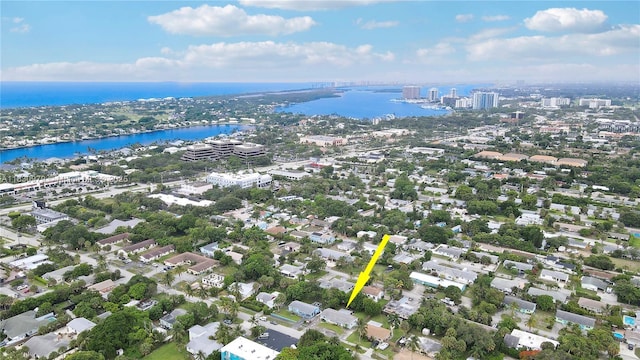 1884 Juno Rd, North Palm Beach, FL 33408 - aerial view of property and surrounding area with a large body of water and nearby urban area