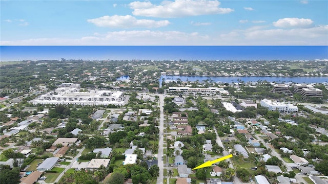 1884 Juno Rd, North Palm Beach, FL 33408 - aerial overview of property's location featuring a nearby body of water and nearby suburban area