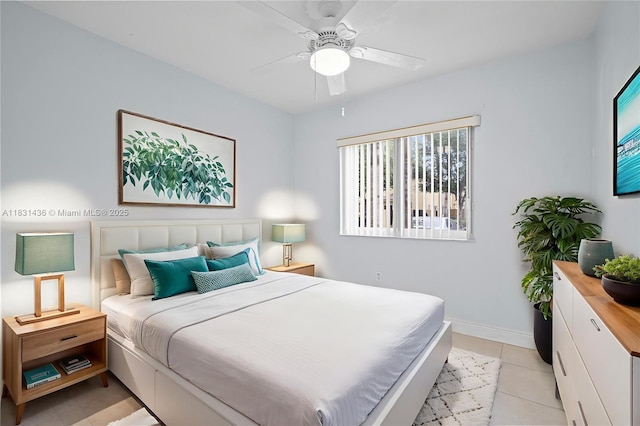 980 NE 33rd Ter Unit 104, Homestead, FL 33033 - bedroom featuring light tile patterned floors and a ceiling fan